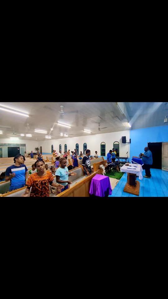 Young people worshipping in the sanctuary at Klivtrn Harvest Presbyterian Church